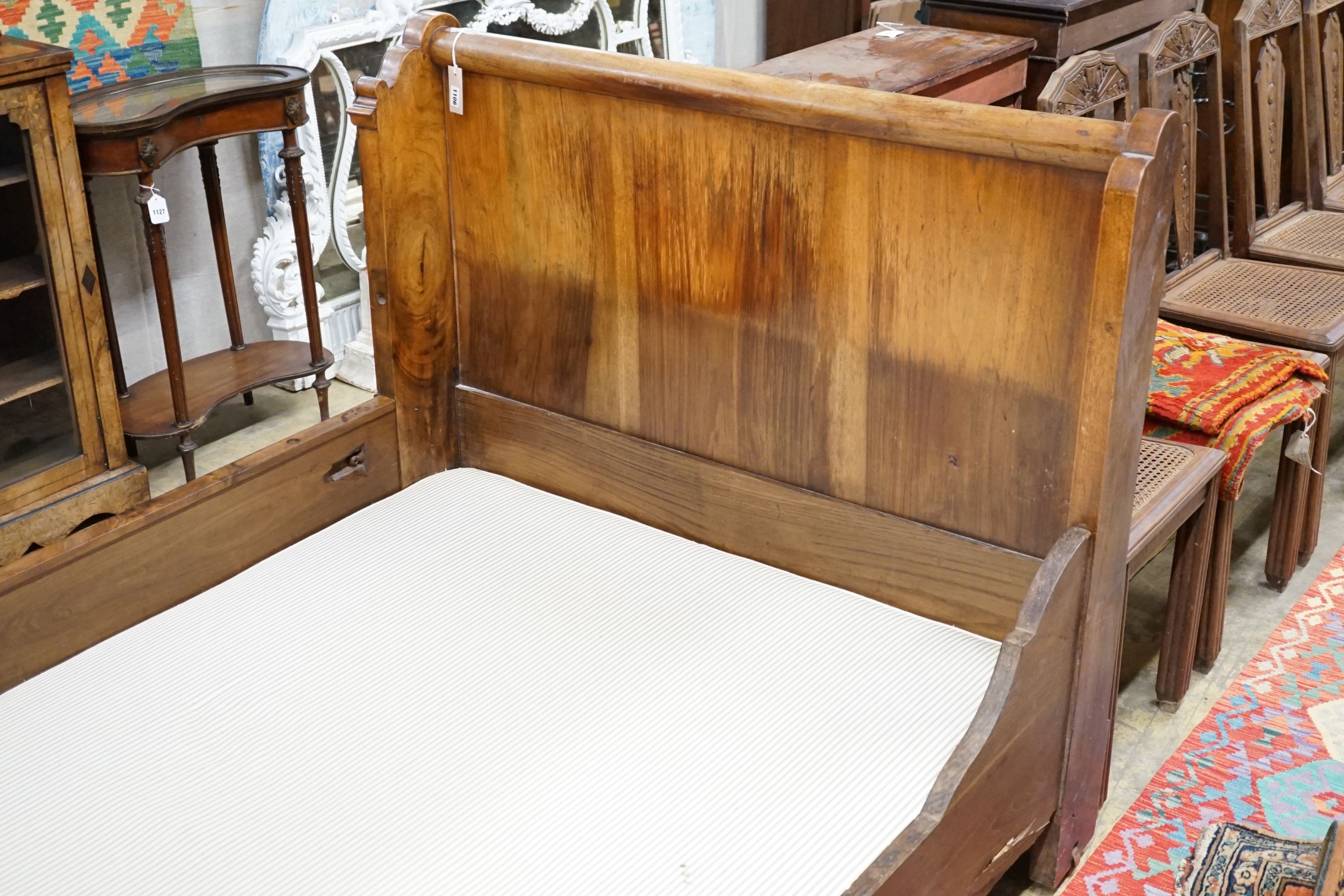 A 19th century Continental Gothic Revival mahogany sleigh bed, 209cm long, 126cm wide